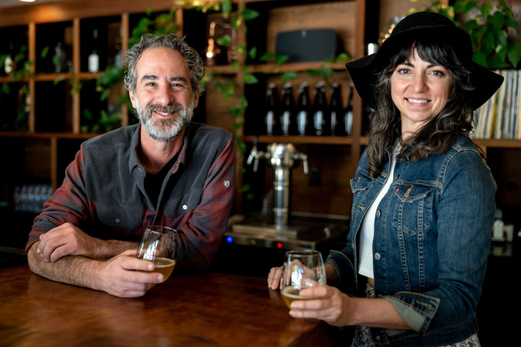 Suzanne Higgins and Chris Condos, owners of Horse and Plow Winery in their Tasting Room in Sebastopol, CA